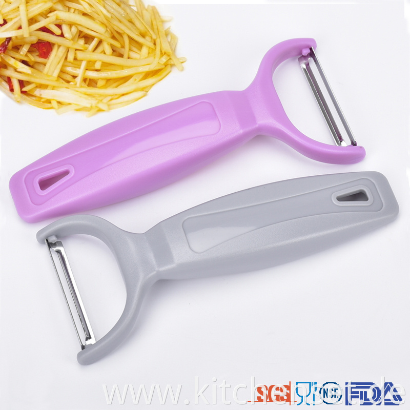 Wholesales Light Comfort Grips Fruit Orange Peeler